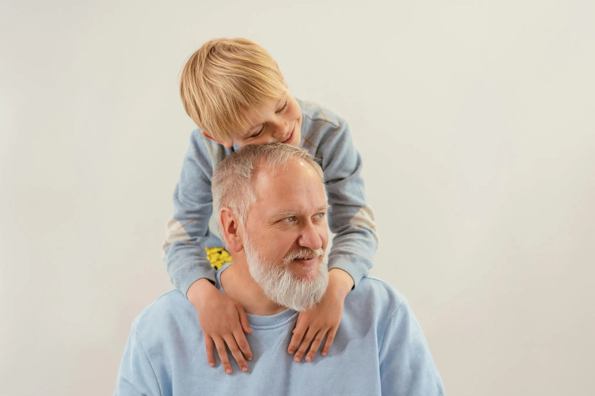 An old man and a young boy living with symptoms of hereditary hemochromatosis.
