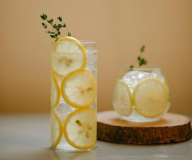 glasses with lemon juice advertised as detoxification boosters